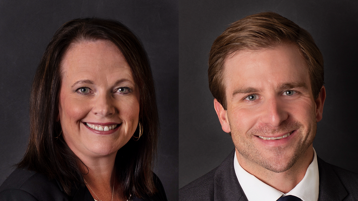 Trisha Harlamert, left, and Scott Montgomery, right, smile in front of a black background.