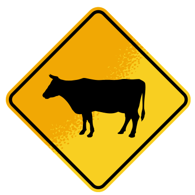 Yellow cattle crossing sign